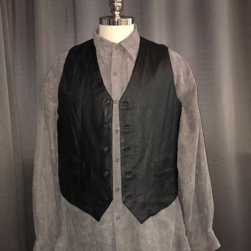 NWT*100% Black leather vest.